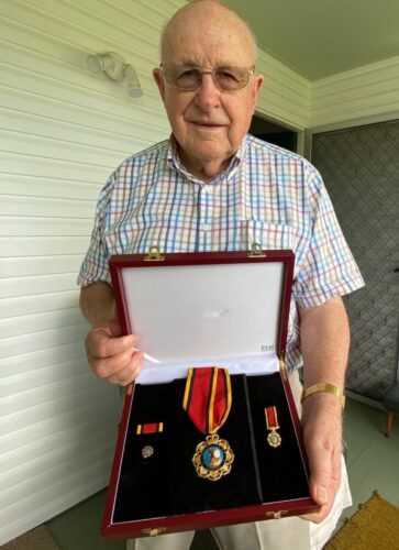 Fred Stolz displays his Order of Australia Medal